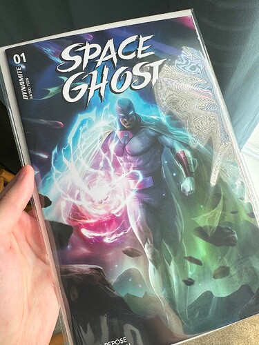 The same hand as before, this time holding Dynamite's Space Ghost issue 1, released just this month. Space Ghost looks angry!